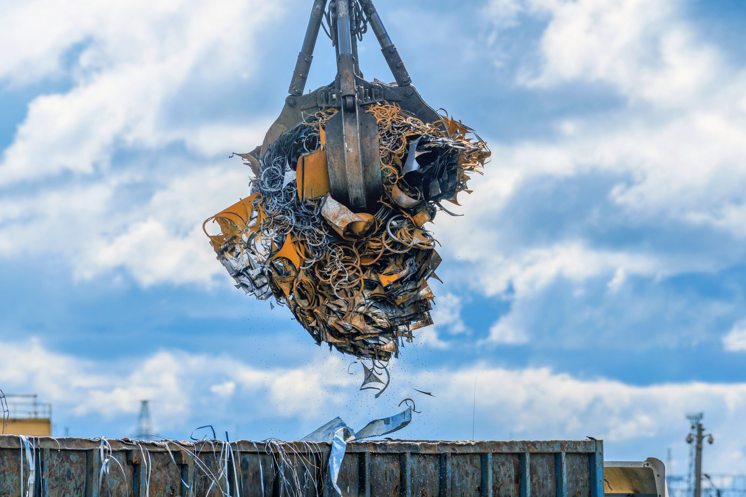 Crane lifts scrap metal